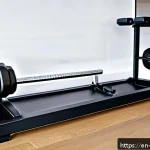 홈트레이닝용 덤벨 추천 - A modern home gym setup featuring a compact adjustable dumbbell set with a sleek dial weight selecti...